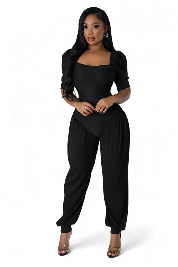 Black Ribbed Stretch Jumpsuit by The House of Stylez