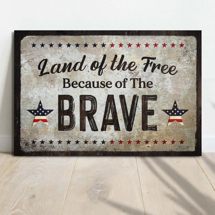 Land Of The Free Because Of The Brave Sign by Tailored Canvases