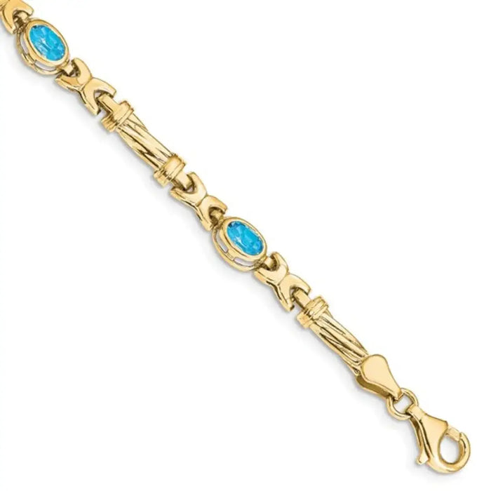 Oval Swiss Blue Topaz Bezel 10K Yellow Gold Fancy Link Bracelet by Fine Color Jewels