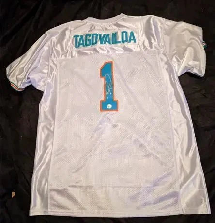 Tua Tagovailoa Miami Dolphins autographed jersey with COA by Price Is Right Miami
