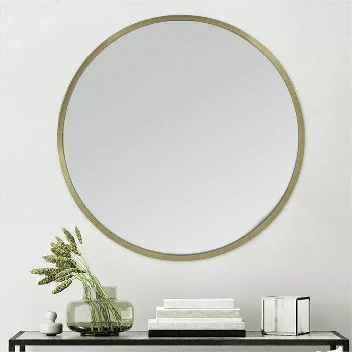 Stratton Home Decor Ava Round Mirror in Gold by Vanessa Jane