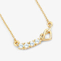 0.24 Ct Round Blue Aquamarine Prong 18K Gold Plated Silver Heart & Infinity Necklace by Fine Color Jewels
