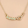 0.28 Ct Round Green Peridot Prong 18K Gold Plated Silver Heart & Infinity Necklace by Fine Color Jewels