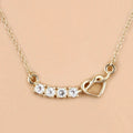 0.30 Ct Round Blue Topaz Prong 18K Gold Plated Silver Heart & Infinity Necklace by Fine Color Jewels