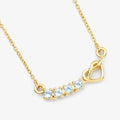 0.30 Ct Round Blue Topaz Prong 18K Gold Plated Silver Heart & Infinity Necklace by Fine Color Jewels