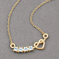 0.30 Ct Round Blue Topaz Prong 18K Gold Plated Silver Heart & Infinity Necklace by Fine Color Jewels