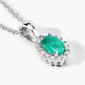 0.44 Ct oval green Zambian Emerald and Lab Diamond prong Silver Halo pendant Necklace by Fine Color Jewels