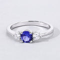 0.47 Ct Round Violet Tanzanite & Lab Diamond Prong Silver Three Stone Ring by Fine Color Jewels