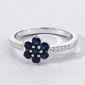 0.49 Ct Round Blue Sapphire and Lab Diamond Prong Silver Pave Floral Ring by Fine Color Jewels
