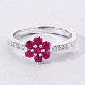 0.49 Ct Round Red Mozambique Ruby and Lab Diamond Prong Silver Pave Floral Ring by Fine Color Jewels