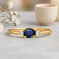 0.53 Ct Oval Blue Sapphire and White Sapphire Prong 22k Gold Vermeil Three Stone Promise Ring by Fine Color Jewels