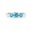0.55 Ct Round Natural Blue Paraiba Apatite Prong Rhodium Silver Three Stone Ring