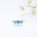 0.55 Ct Round Natural Blue Paraiba Apatite Prong Rhodium Silver Three Stone Ring by Fine Color Jewels