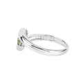 0.56 Ct Oval Green Peridot Channel Silver Three Stone Bypass Ring by Fine Color Jewels