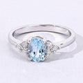 0.60 Ct Oval Blue Aquamarine and Lab Diamond Prong Silver Cocktail Ring by Fine Color Jewels