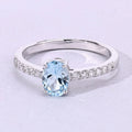 0.60 Ct Oval Blue Aquamarine and Lab Diamond Prong Silver Pave Band Ring by Fine Color Jewels