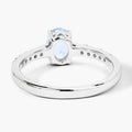 0.60 Ct Oval Blue Aquamarine and Lab Diamond Prong Silver Pave Band Ring by Fine Color Jewels