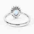 0.60 Ct Oval Blue Aquamarine and Lab Diamond Prong Sterling Silver Halo Ring by Fine Color Jewels