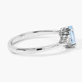 0.60 Ct Oval Blue Aquamarine and Lab Diamond Prong Sterling Silver Bypass Ring by Fine Color Jewels