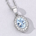 0.60 Ct Oval Blue Aquamarine & Lab Diamond Prong Silver Halo Pendant Necklace by Fine Color Jewels