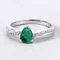 0.65 Ct Pear Green Zambian Emerald & Lab Diamond Prong Silver Pave Crossover Ring by Fine Color Jewels