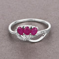 0.66 Ct Oval Pink Ruby & Diamond Prong 14K White Gold Pave Three Stone Knot Ring by Fine Color Jewels
