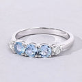 0.66 Ct Round Blue Aquamarine and Lab Diamond Prong Silver Five Stone Ring by Fine Color Jewels