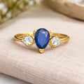 0.67 Ct Pear Blue Sapphire and White Sapphire Prong 22K Gold Vermeil Three Stone Ring by Fine Color Jewels
