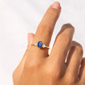 0.67 Ct Pear Blue Sapphire and White Sapphire Prong 22K Gold Vermeil Three Stone Ring by Fine Color Jewels
