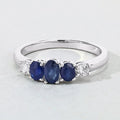 0.69 Ct Oval Blue Sapphire & Lab Diamond Prong Silver Graduated Five Stone Ring by Fine Color Jewels