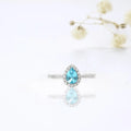 0.7 Ct Pear Blue Natural Paraiba Apatite Prong Rhodium Over Silver Teardrop Halo Ring by Fine Color Jewels