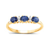 0.70 Ct Oval Blue Sapphire and White Diamond Prong 10k Gold Three Stone Ring