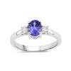 0.75 Ct Oval Violet Tanzanite and Lab Diamond Prong Silver Three Stone Ring