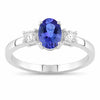 0.75 Ct Oval Violet Tanzanite and Lab Diamond Prong Silver Three Stone Ring