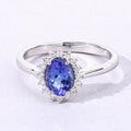 0.75 Ct Oval Violet Tanzanite and Lab Grown Diamond Prong Silver Halo Ring by Fine Color Jewels