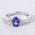 0.75 Ct Oval Violet Tanzanite & Lab Diamond Prong Sterling Silver Bypass Ring by Fine Color Jewels