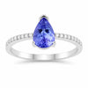 0.78 Ct Pear Violet Tanzanite and Lab Diamond V-Prong Silver Pave Bridge Ring
