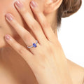 0.78 Ct Pear Violet Tanzanite and Lab Diamond V-Prong Silver Pave Bridge Ring by Fine Color Jewels