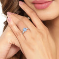 0.80 Ct Octagon Blue Aquamarine and Lab Diamond Prong Silver Three Stone Ring by Fine Color Jewels