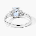 0.80 Ct Octagon Blue Aquamarine and Lab Diamond Prong Silver Three Stone Ring by Fine Color Jewels