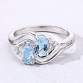 0.80 Ct Oval Blue Aquamarine and Lab Diamond Silver Bypass Promise Ring by Fine Color Jewels