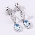 0.80 Ct Oval Blue Aquamarine & Lab Diamond Bezel Silver Dangle Earrings by Fine Color Jewels