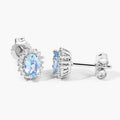 0.80 Ct Oval Blue Aquamarine & Lab Diamond Prong Silver Halo Basket Stud Earrings by Fine Color Jewels