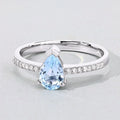 0.80 Ct Pear Blue Aquamarine and Lab Diamond V-Prong Silver Pave Bridge Ring by Fine Color Jewels