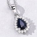 0.80 Ct Pear Blue Sapphire and Lab Diamond Prong Silver Halo teardrop pendant Necklace by Fine Color Jewels