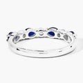 0.80 Ct Pear Blue Sapphire and Lab Diamond Prong Silver Seven Stone Half Eternity Ring by Fine Color Jewels