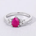 0.80 Ct Pear Pink Mozambique Ruby and Lab Diamond Prong Silver Cocktail Ring by Fine Color Jewels