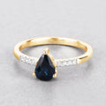 0.86ct Pear Blue Sapphire and Diamond Prong 14K Yellow Gold Teardrop Pave Band Ring by Fine Color Jewels