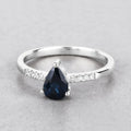 0.86ct Pear Blue Sapphire and Diamond Prong Bridge 14K White Gold Teardrop Pave Band Ring by Fine Color Jewels