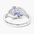 0.88 Ct Oval Violet Tanzanite and Lab Grown Diamond Prong Silver Bypass Ring by Fine Color Jewels